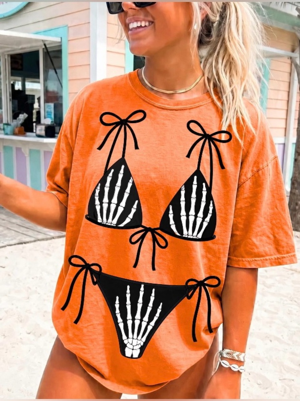 Graphic Tee with Black Skeleton Bikini Print